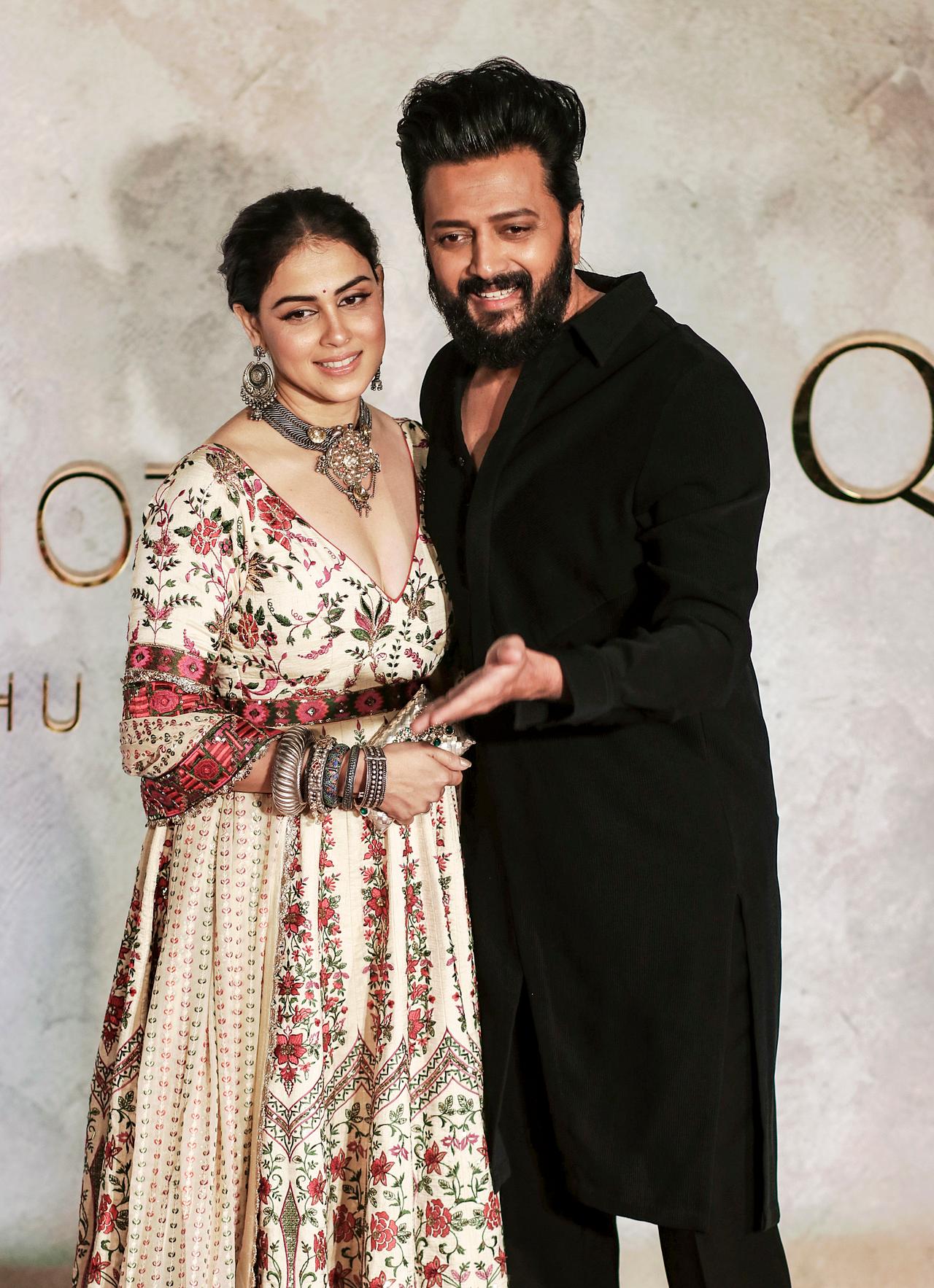 Bollywood’s much-loved couple Genelia and Riteish Deshmukh made a stunning appearance. Genelia Deshmukh exuded regal sophistication in a cream and crimson embroidered Anarkali, while Riteish opted for a sleek and classic black kurta set.